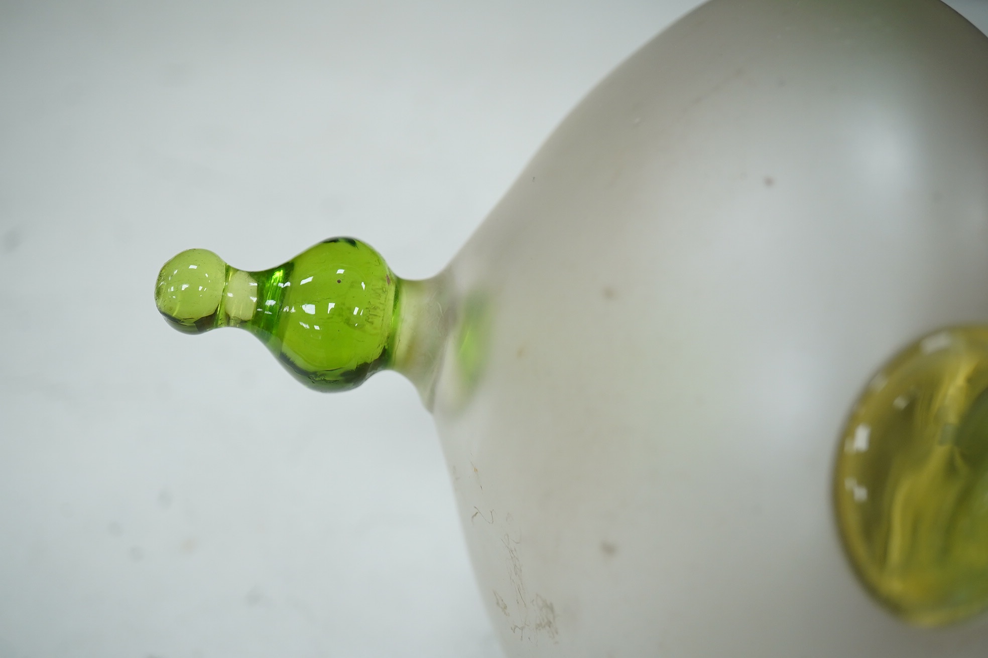 An Art Nouveau frosted and green glass pendant light, with brass attachment and hook, 25cm high. Condition - good